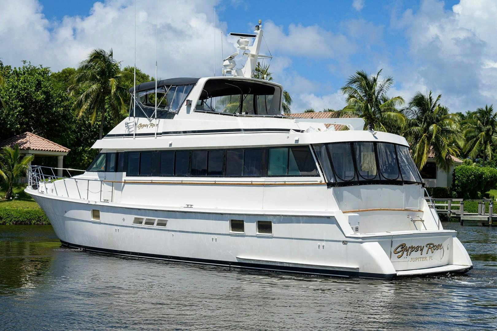 a white boat on the water aboard GYPSY ROSE Yacht for Sale
