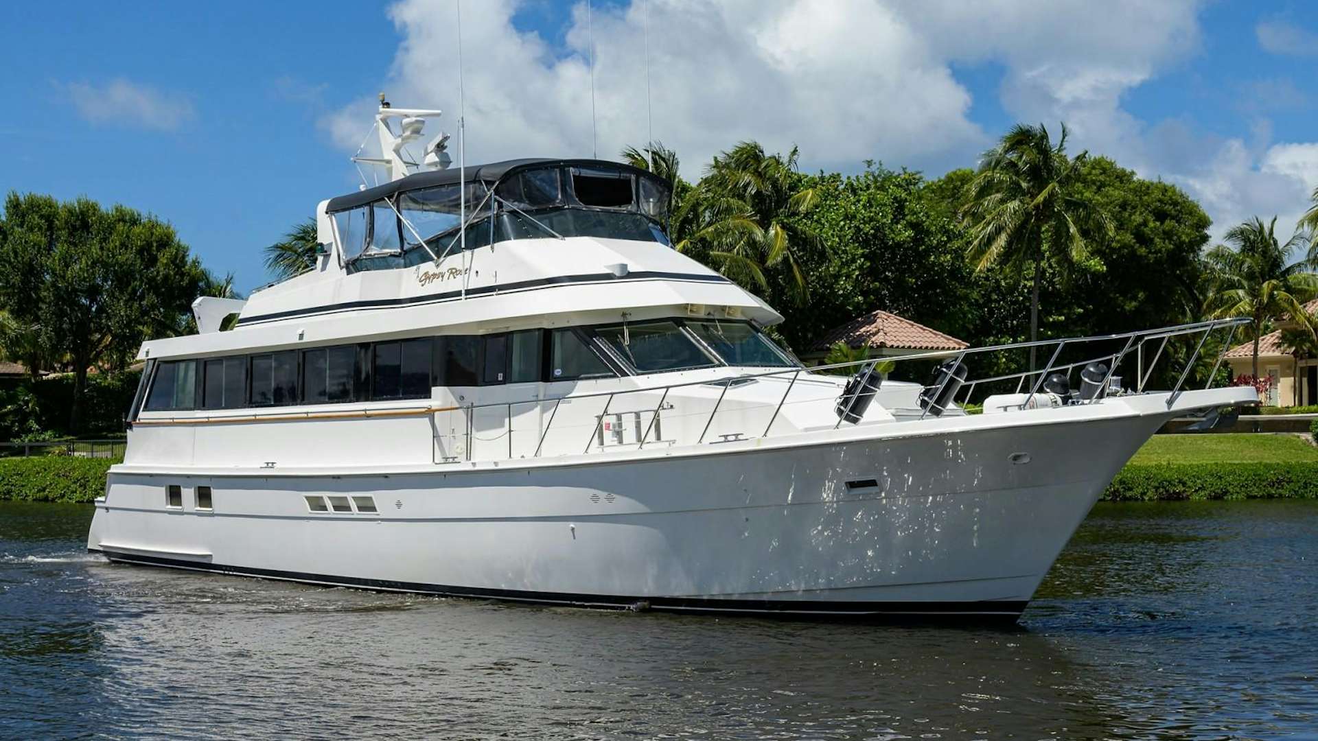 a white boat on water aboard GYPSY ROSE Yacht for Sale