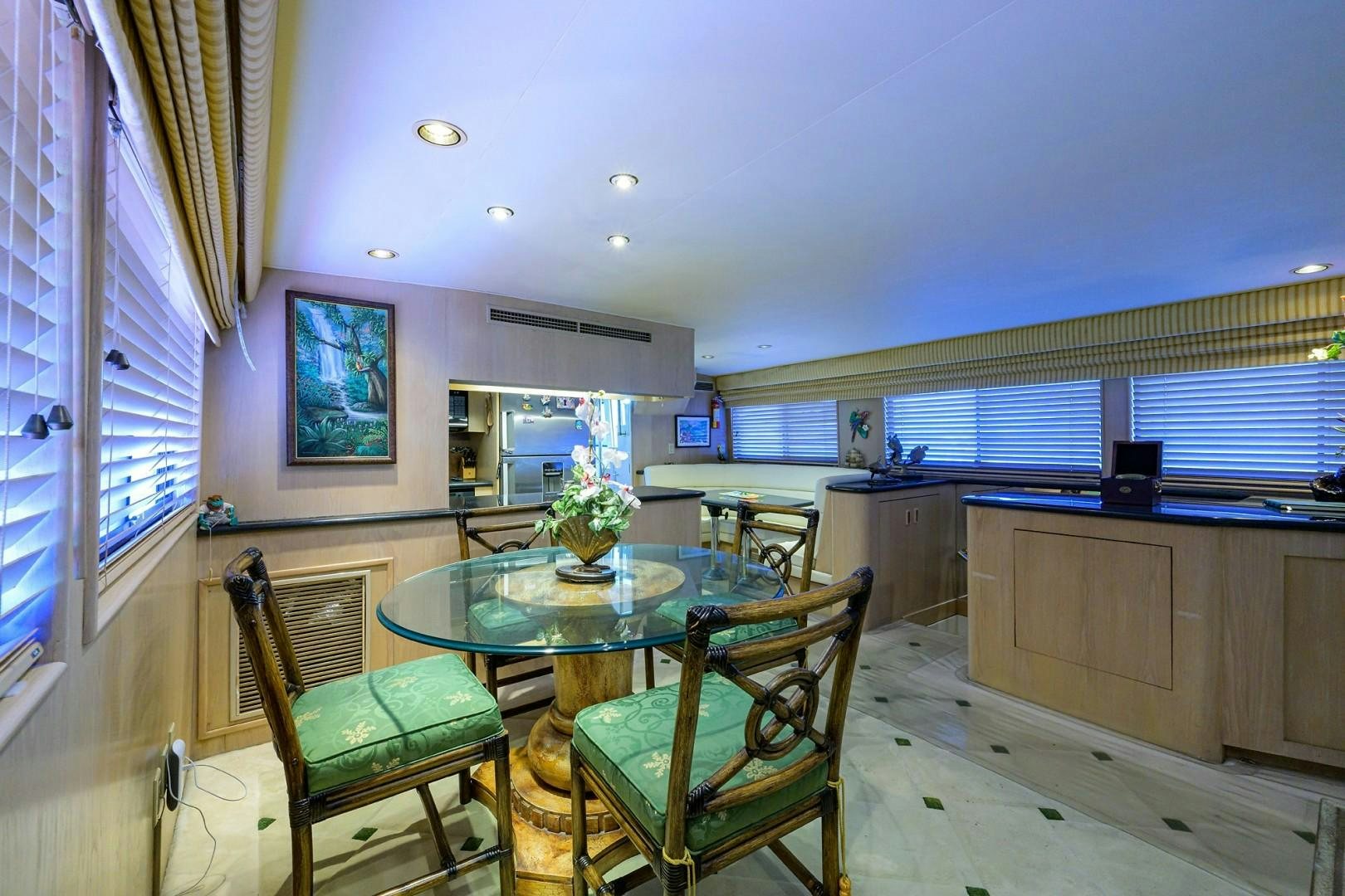 a dining table in a room aboard GYPSY ROSE Yacht for Sale