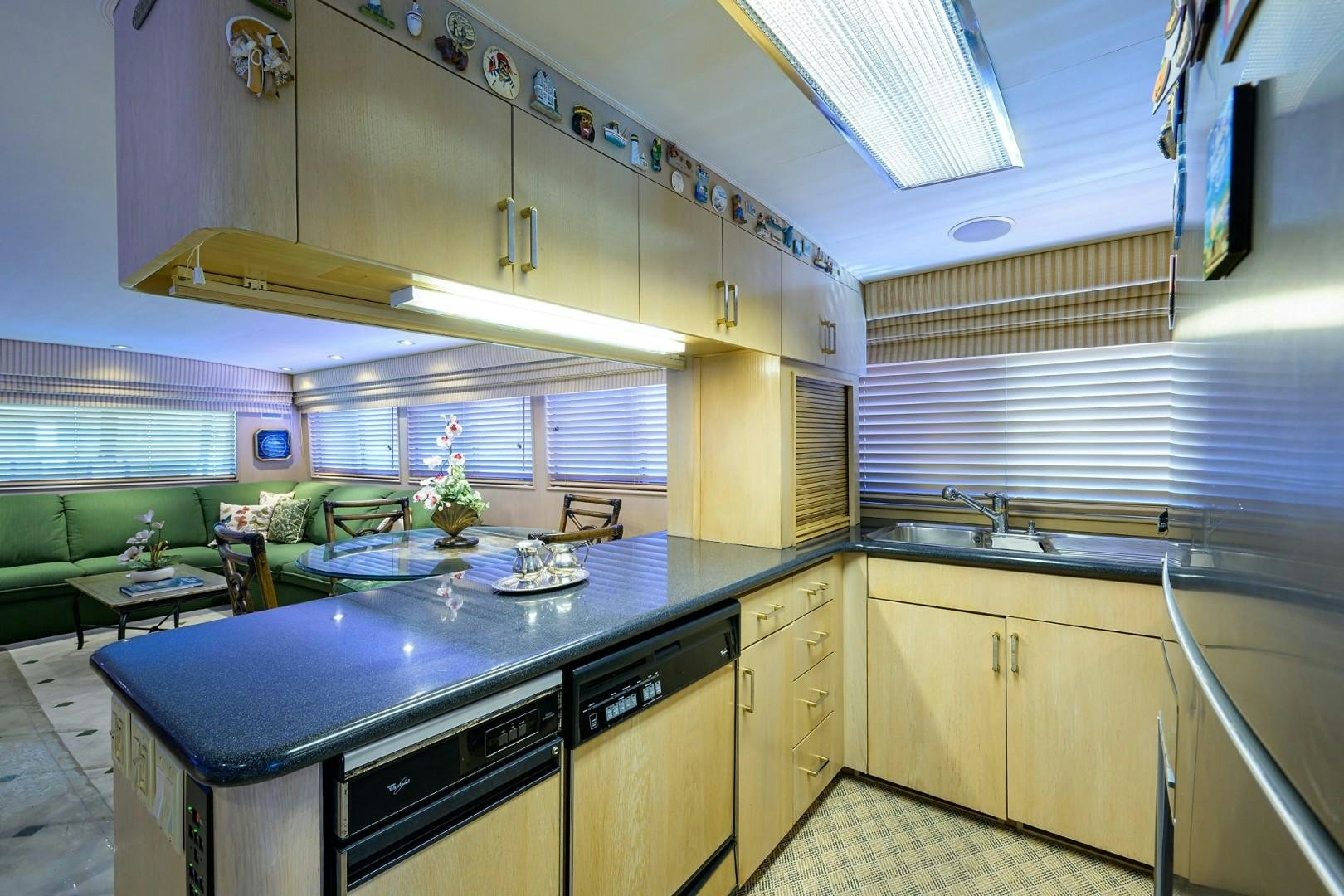 a kitchen with a large island aboard GYPSY ROSE Yacht for Sale