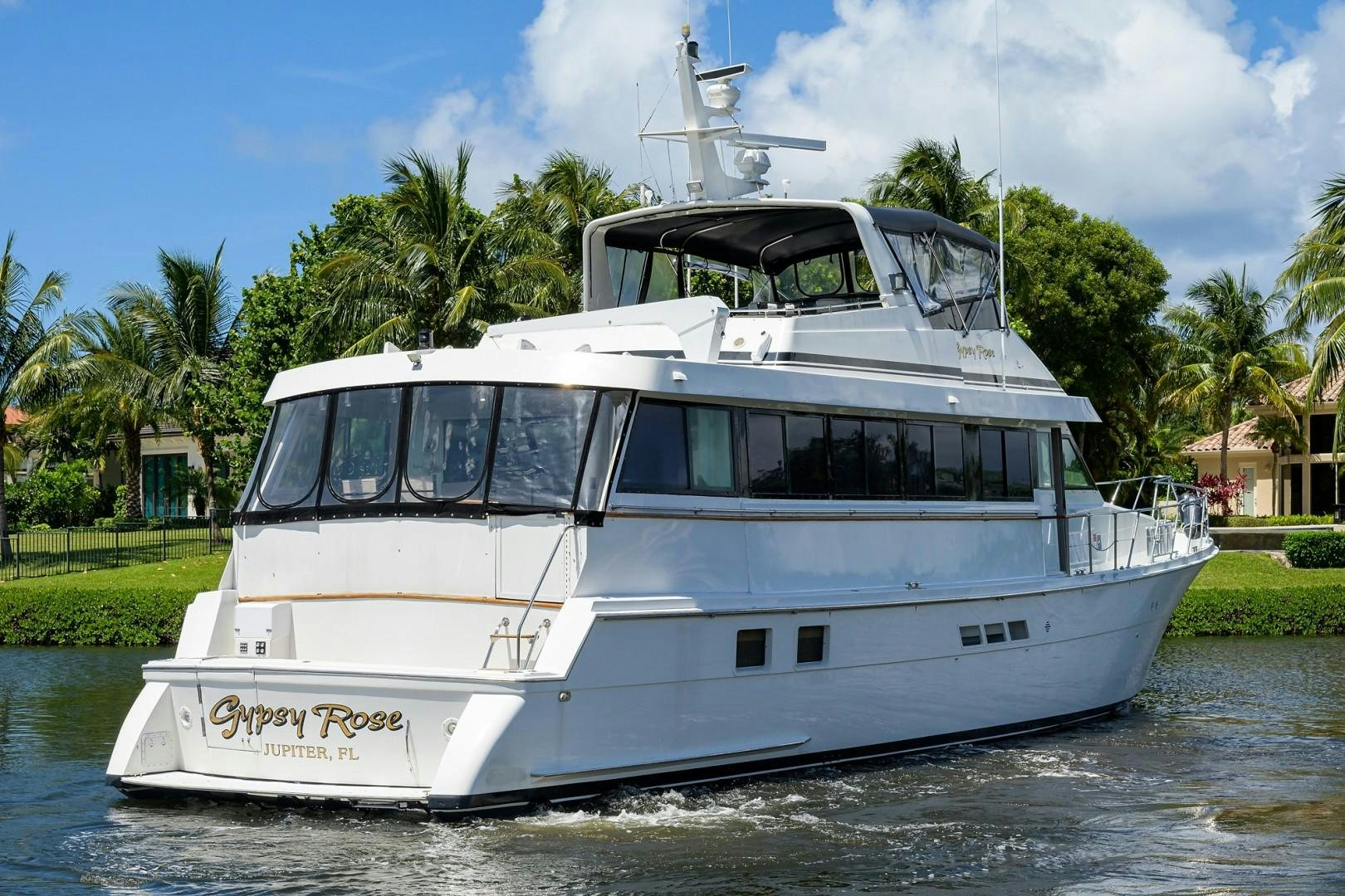 a white boat on the water aboard GYPSY ROSE Yacht for Sale
