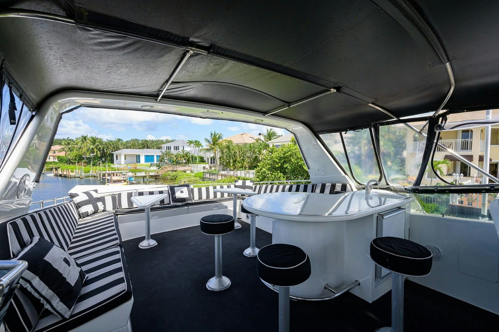 a room with a table and chairs aboard GYPSY ROSE Yacht for Sale