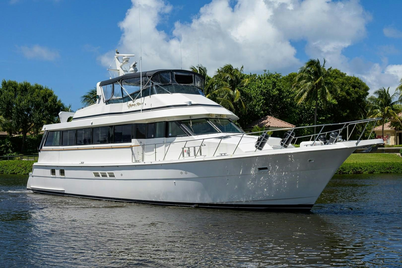 a white boat on water aboard GYPSY ROSE Yacht for Sale