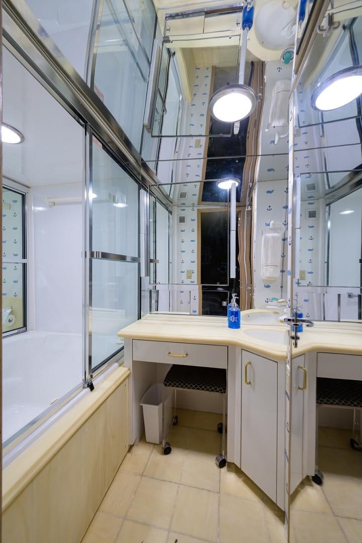 a bathroom with a sink and a mirror aboard GYPSY ROSE Yacht for Sale