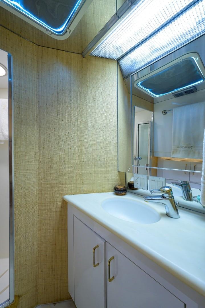 a bathroom with a sink and a mirror aboard GYPSY ROSE Yacht for Sale