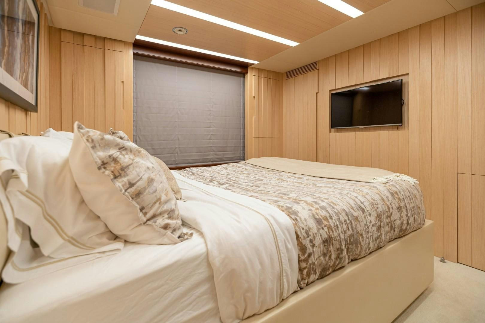 a bed with white sheets aboard DYLAN ANNE Yacht for Sale