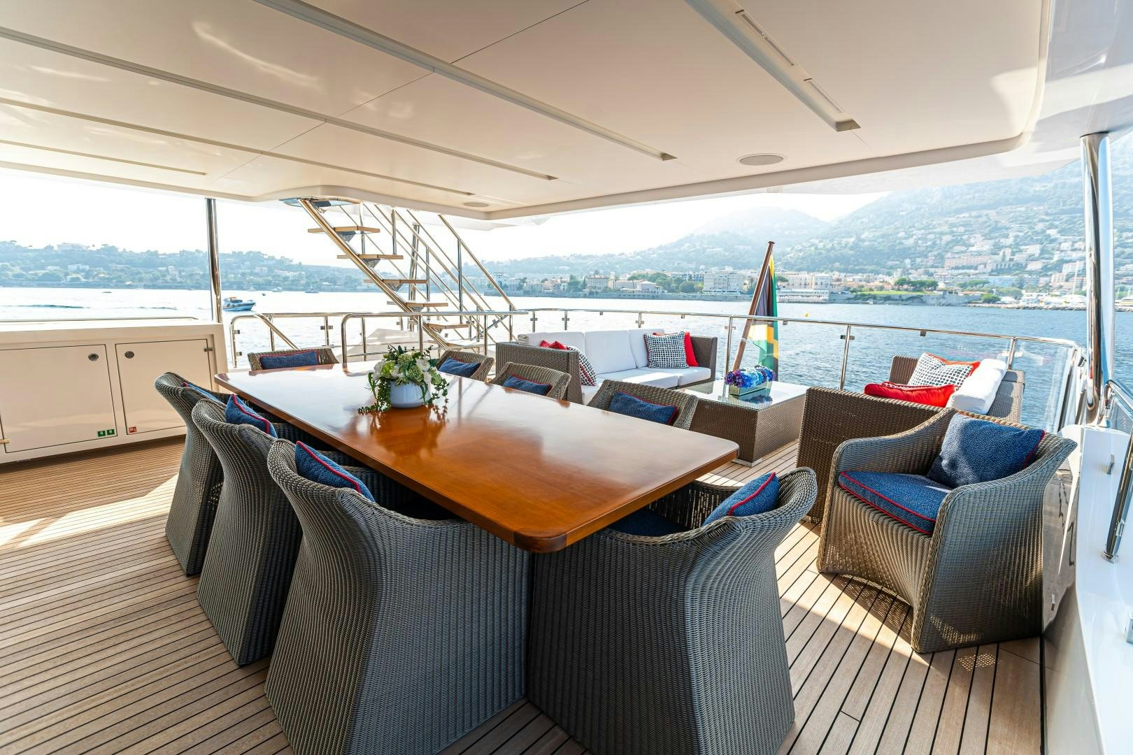 a table and chairs on a deck aboard DYLAN ANNE Yacht for Sale