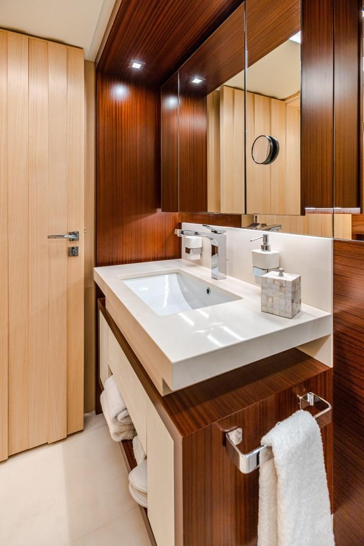 a bathroom with a sink and a mirror aboard DYLAN ANNE Yacht for Sale