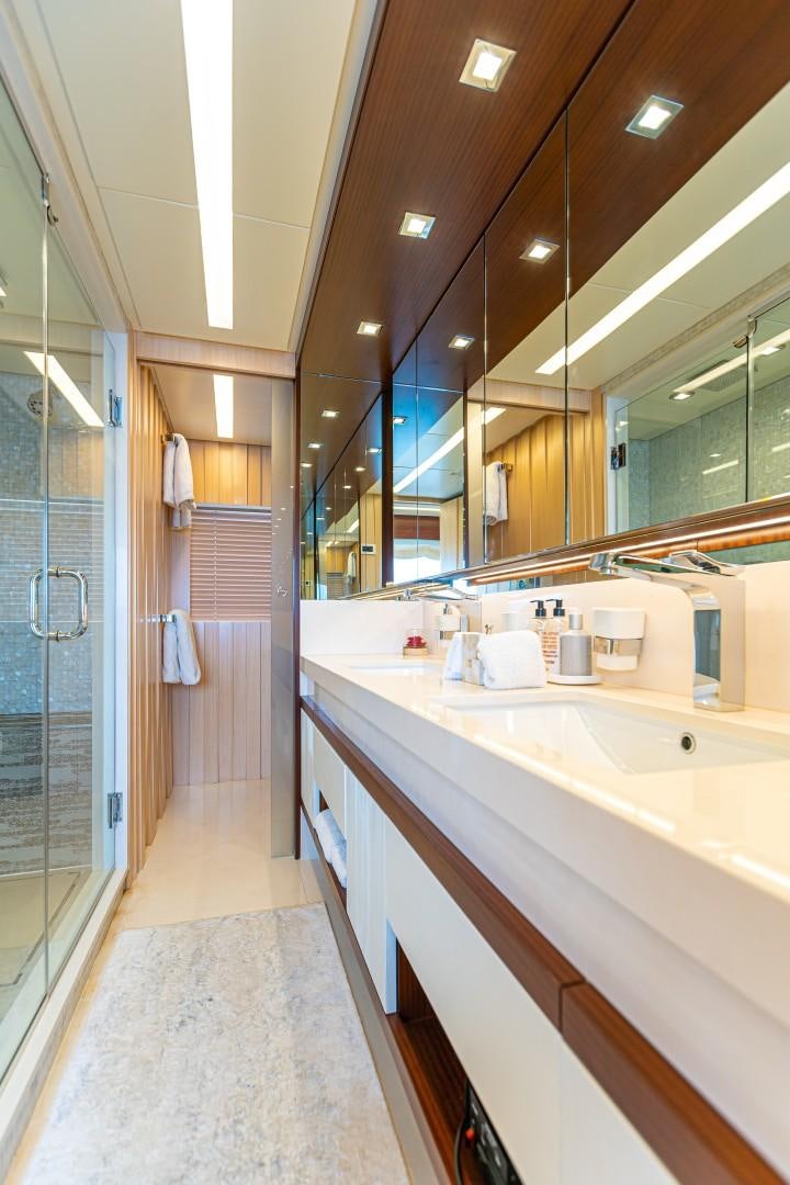a bathroom with a large mirror aboard DYLAN ANNE Yacht for Sale