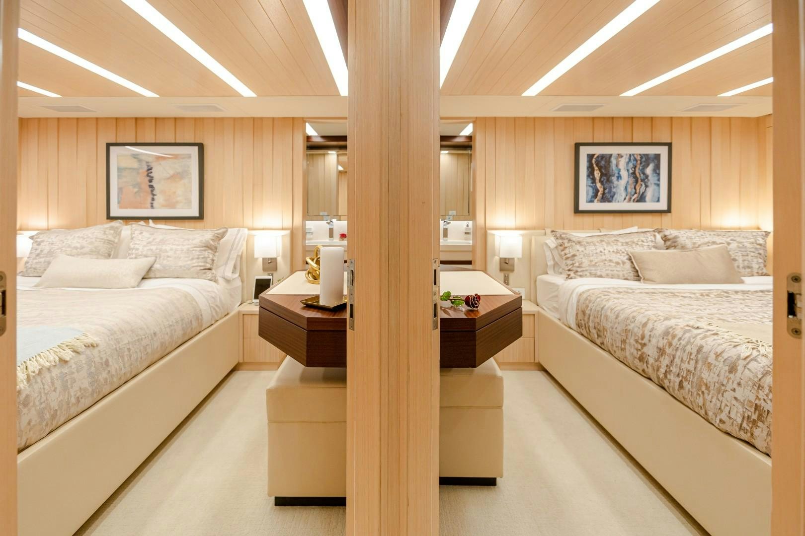 a room with a couple of beds aboard DYLAN ANNE Yacht for Sale
