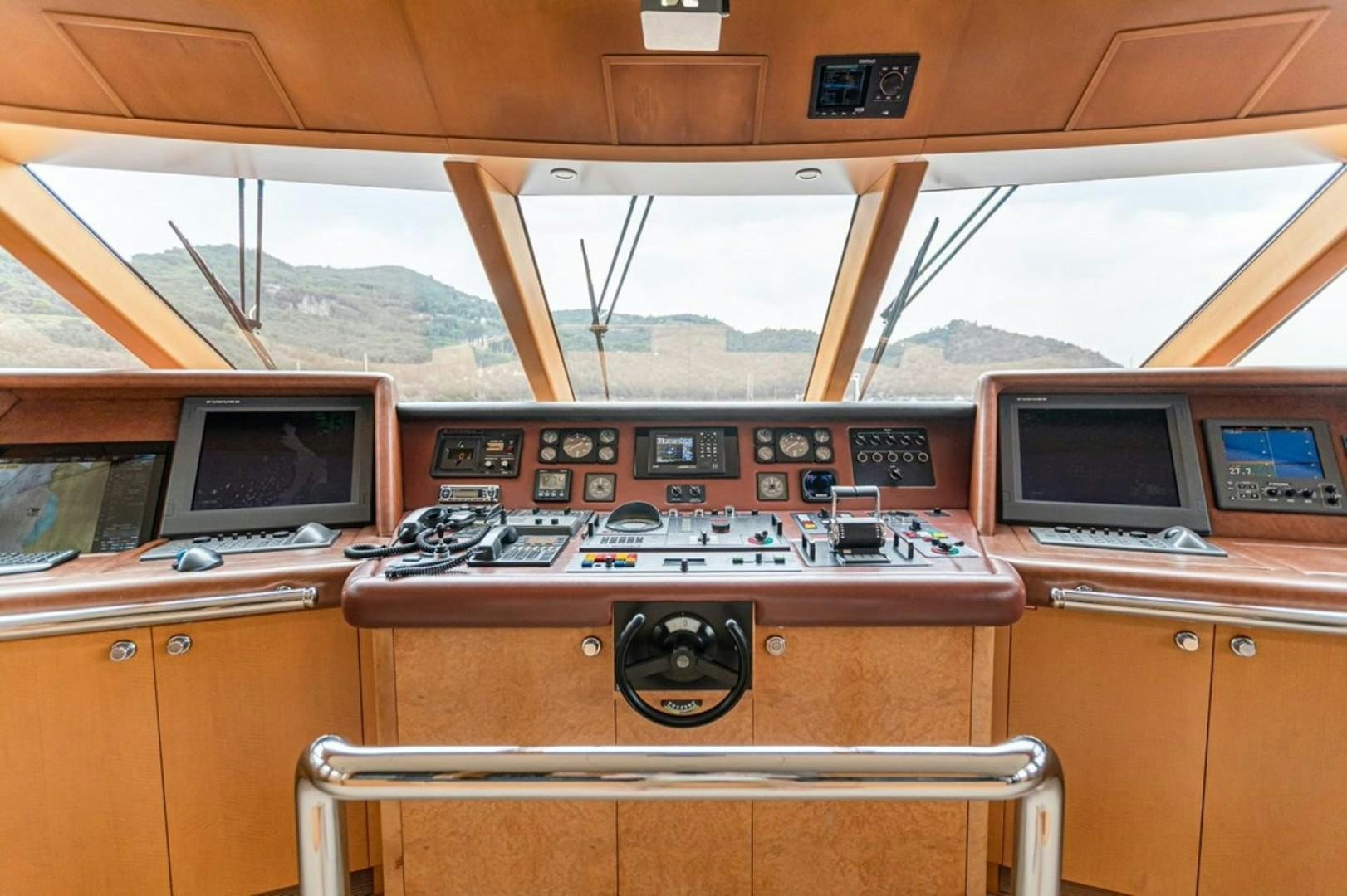 a vehicle with a computer and a monitor on the side aboard TASIA Yacht for Sale
