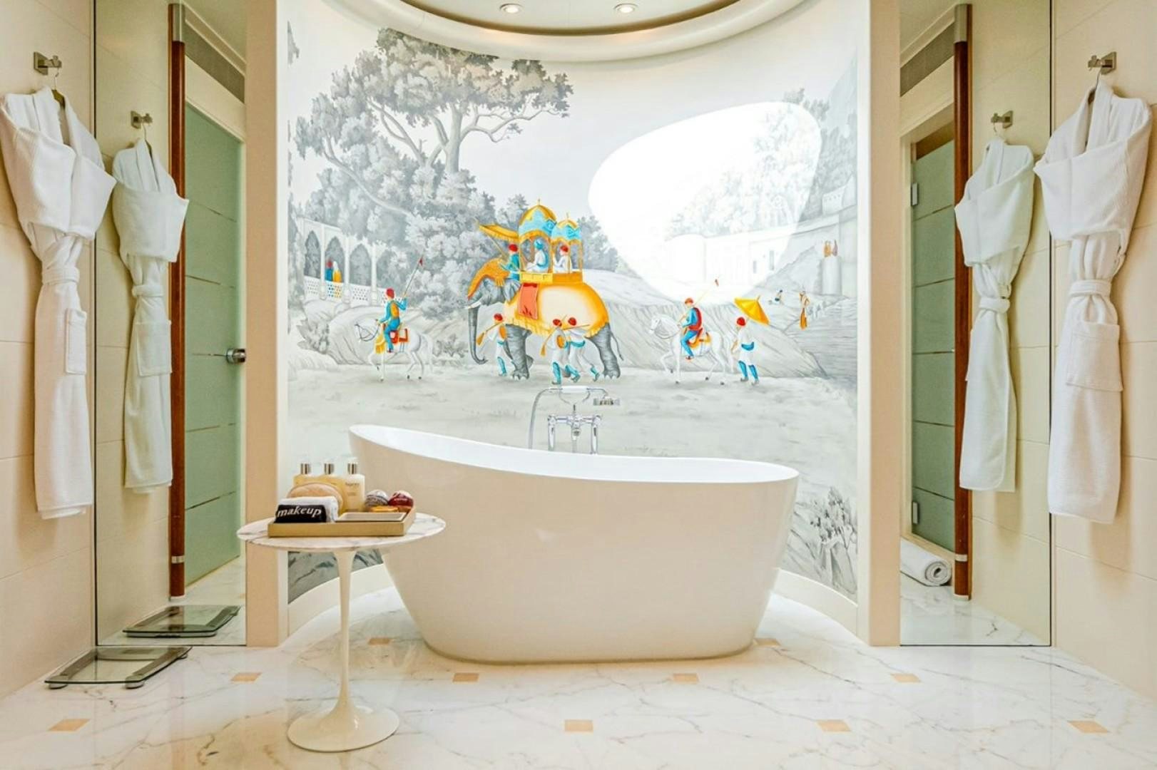 a bathroom with a large mirror aboard TASIA Yacht for Sale