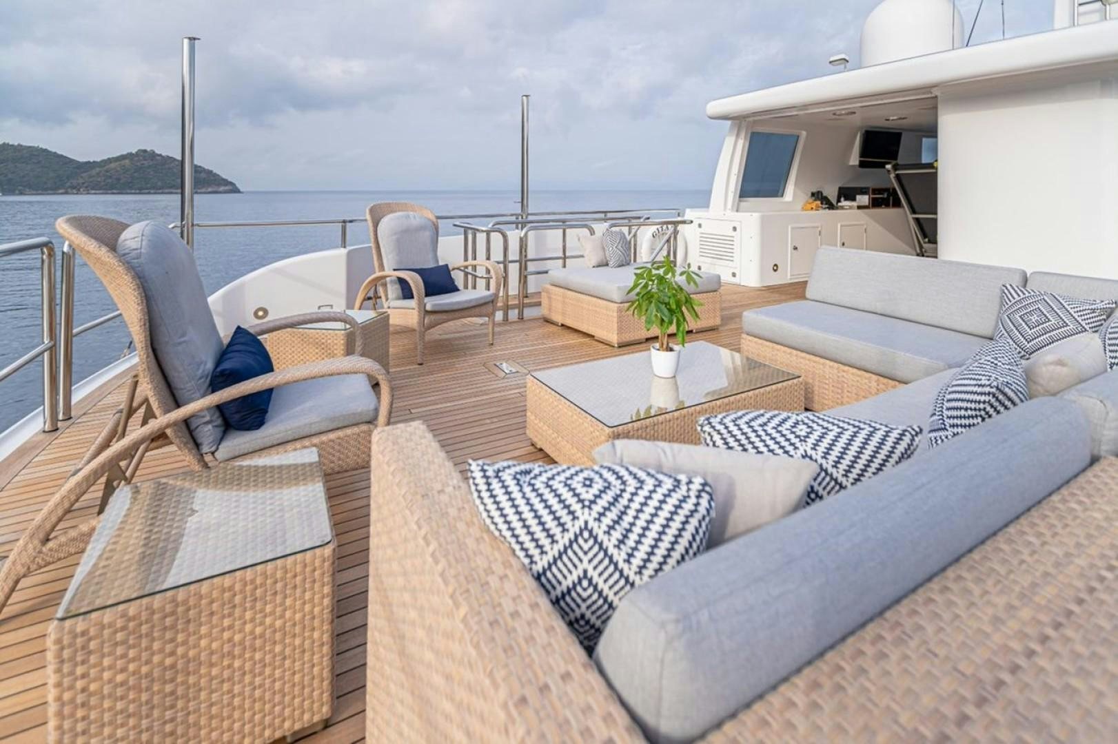 a living room with a large body of water aboard TASIA Yacht for Sale