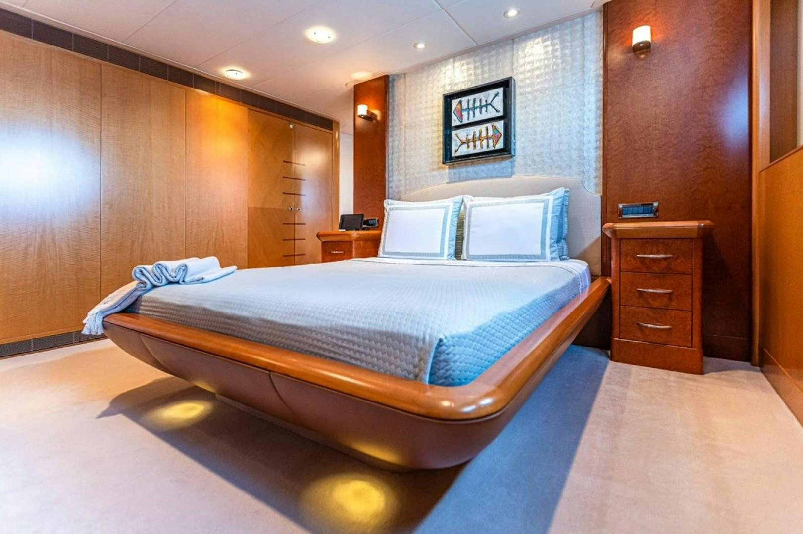 a bed in a room aboard TASIA Yacht for Sale