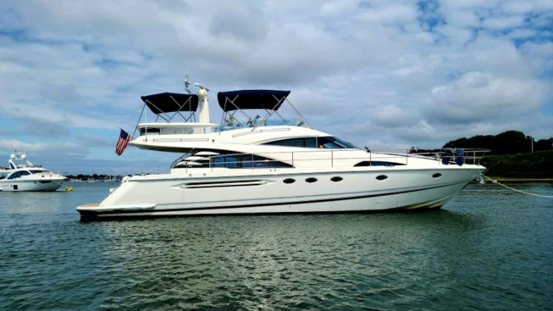 a white yacht in the water aboard CAT'S A NOVA Yacht for Sale