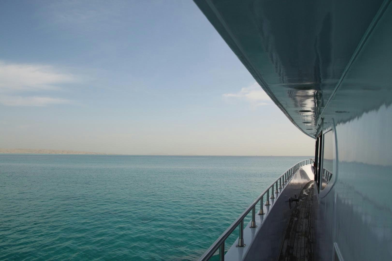 a boat on the water aboard SIM SIM Yacht for Sale