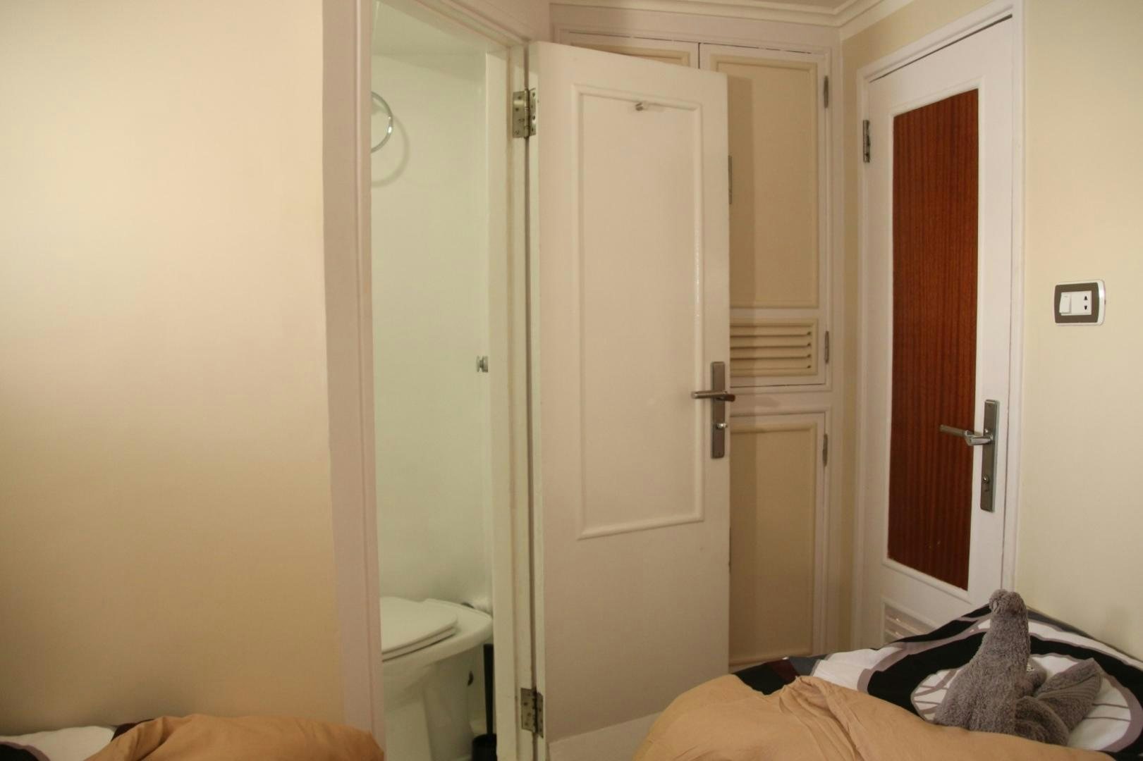 a person lying on a bed aboard SIM SIM Yacht for Sale