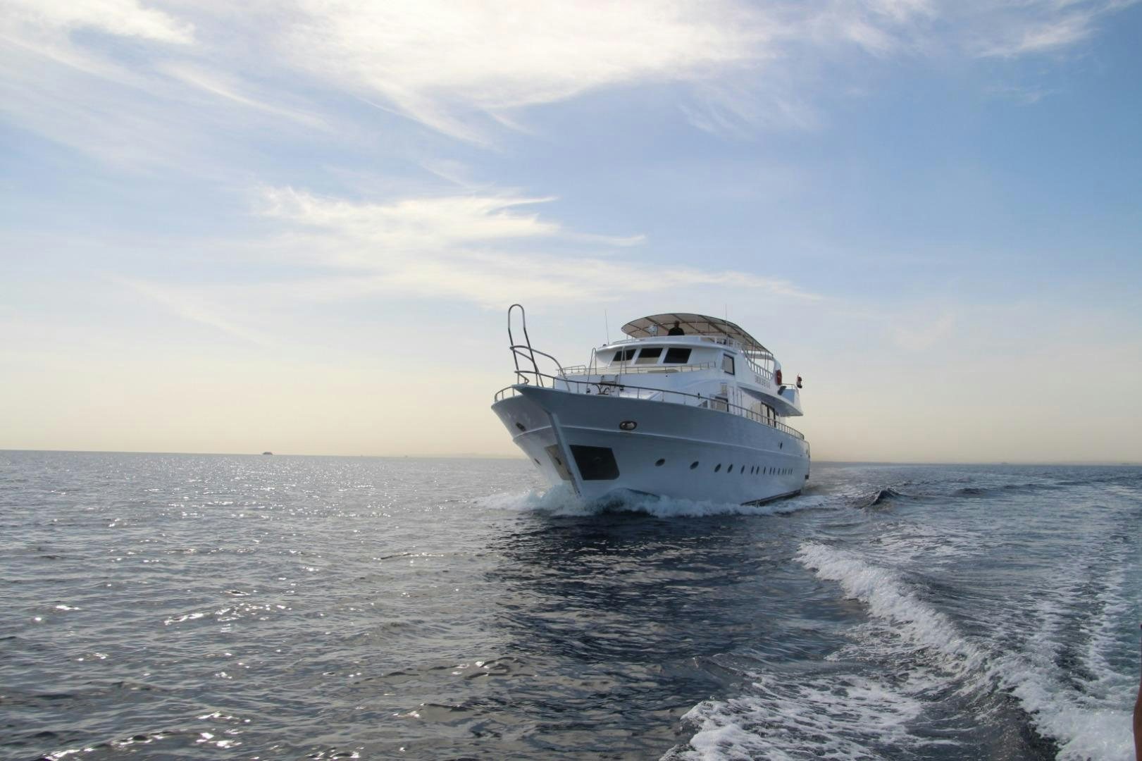 a boat in the water aboard SIM SIM Yacht for Sale