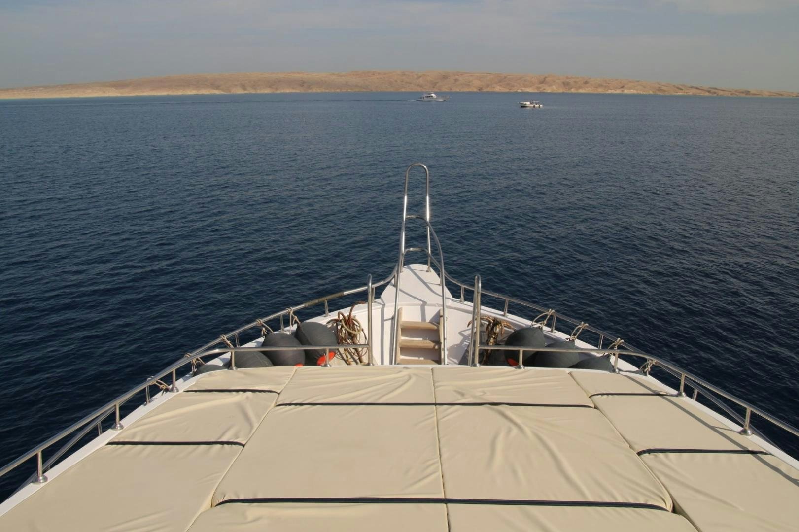 a boat on the water aboard SIM SIM Yacht for Sale