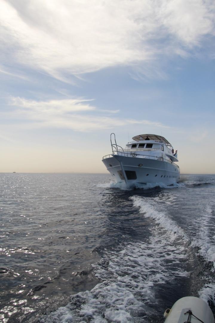 a boat in the water aboard SIM SIM Yacht for Sale