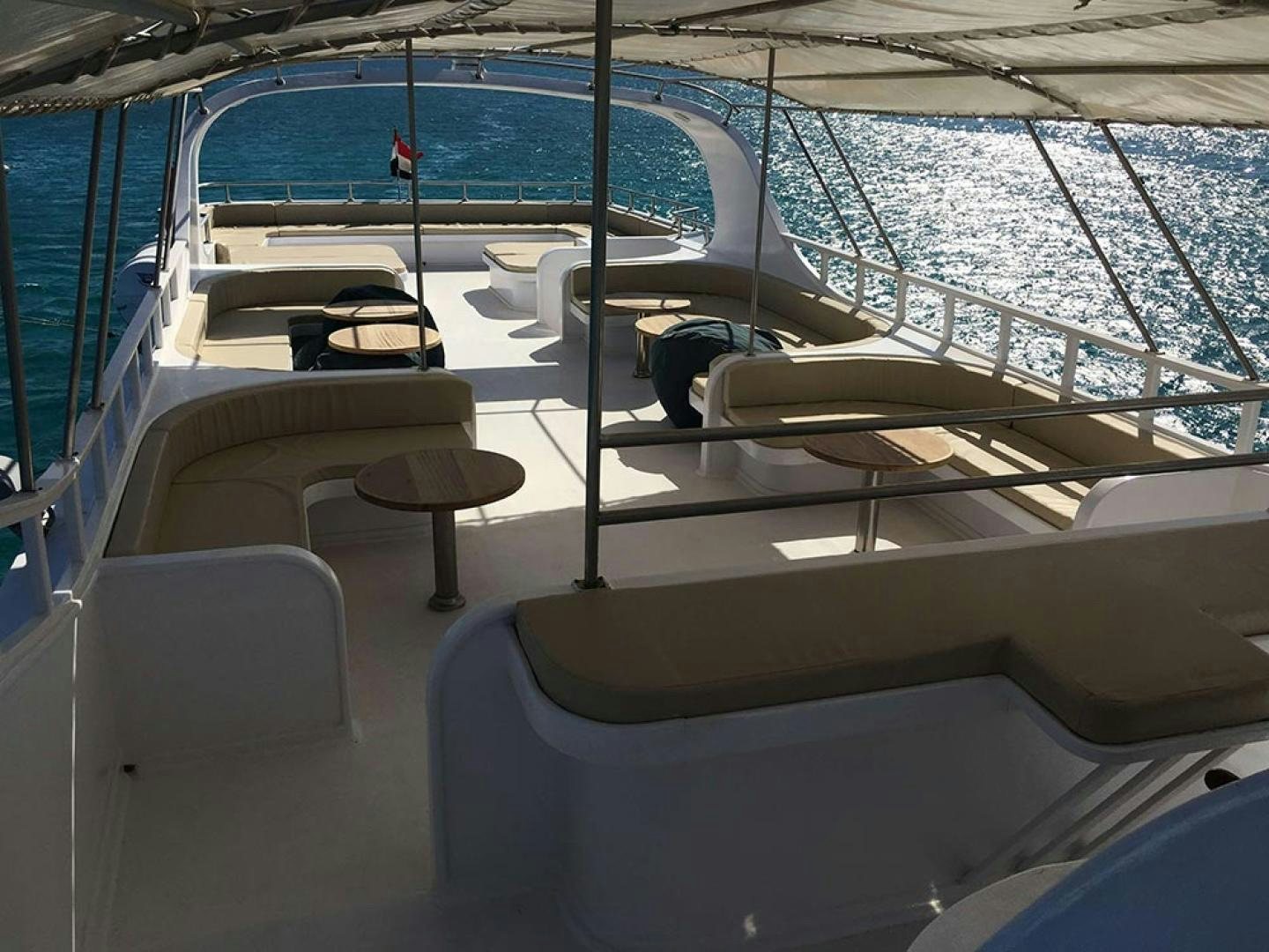 a boat with a person on the deck aboard SIM SIM Yacht for Sale