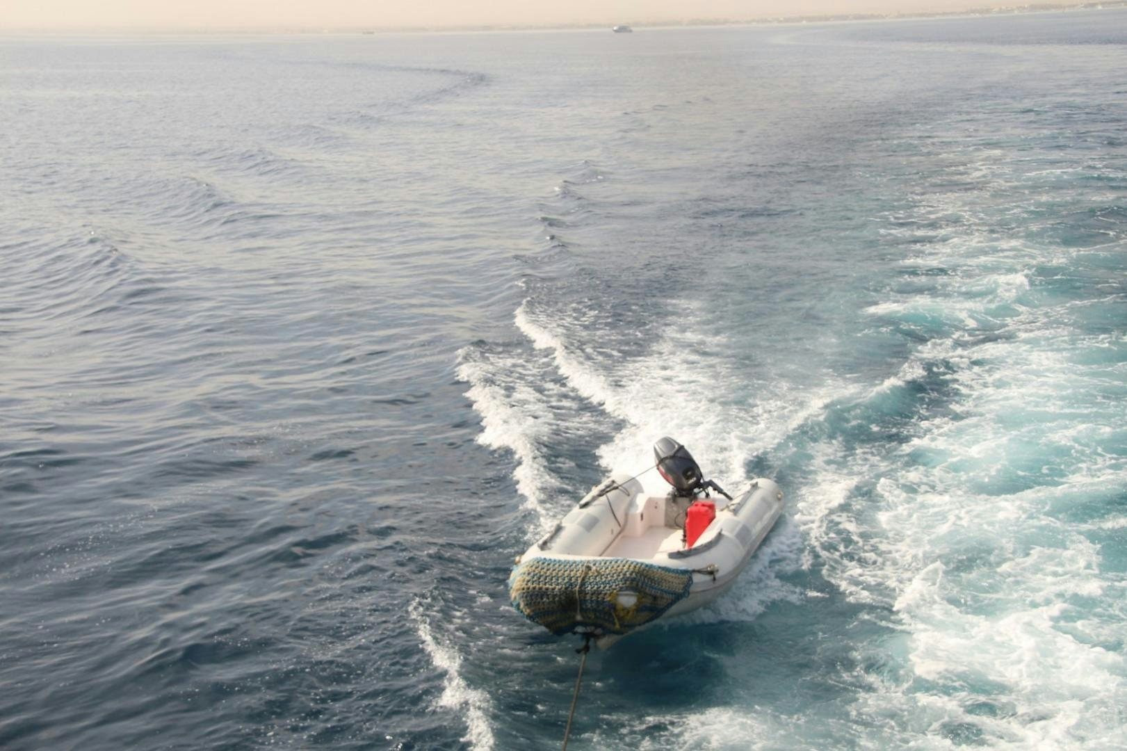 a boat in the water aboard SIM SIM Yacht for Sale