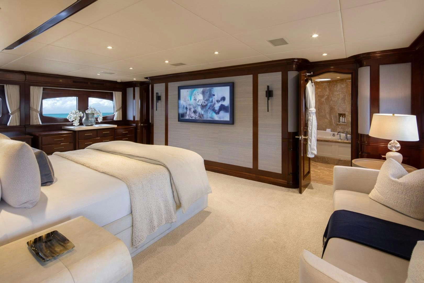 a hotel room with a bed and a desk aboard BACCHUS "NAME RESERVED" Yacht for Sale