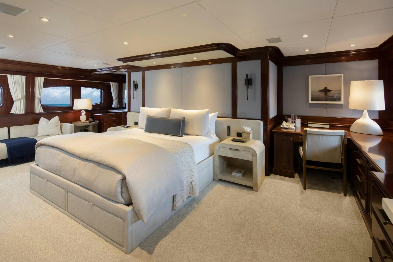 a room with a bed and a desk aboard BACCHUS "NAME RESERVED" Yacht for Sale