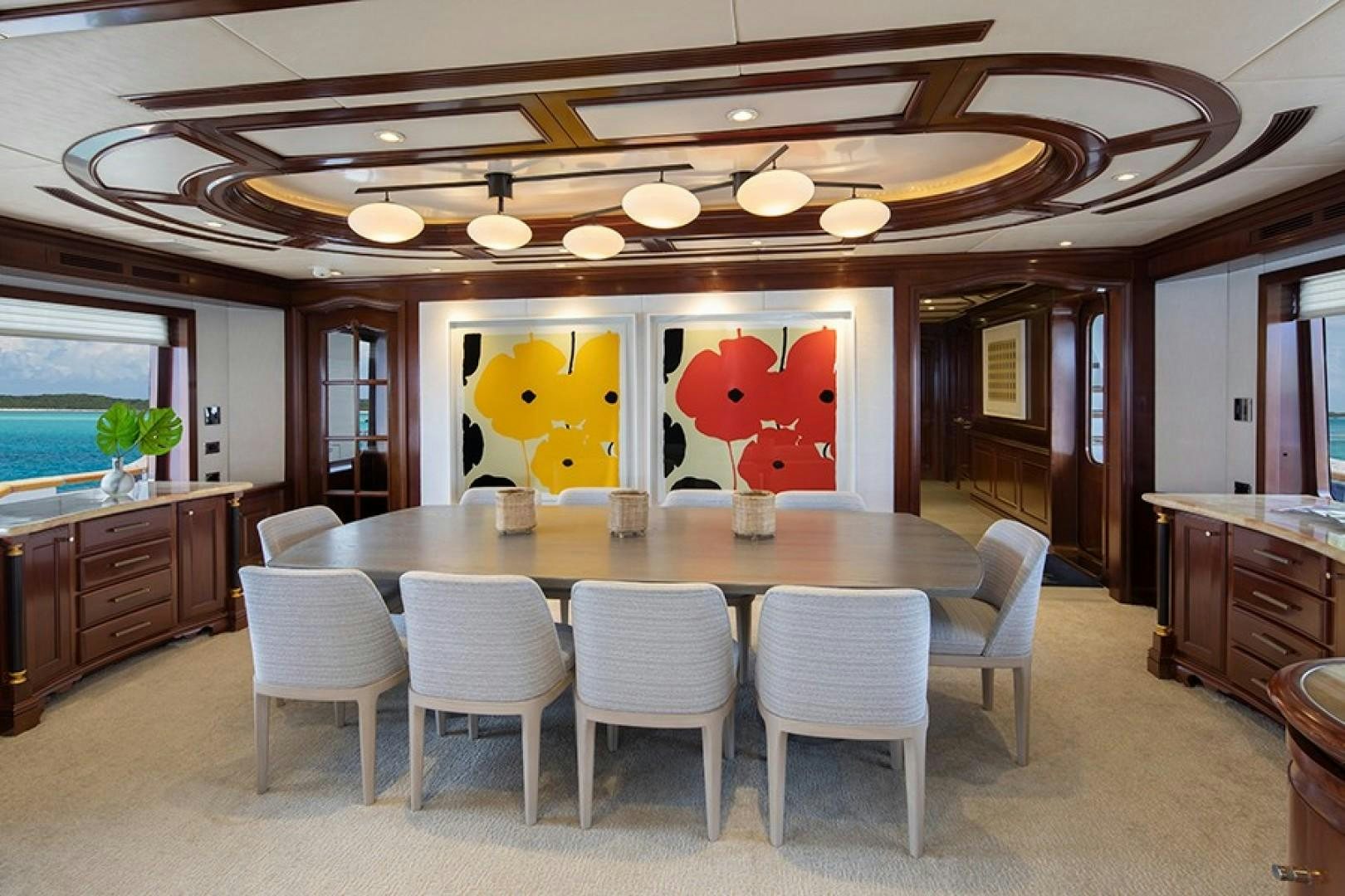 a large dining table in a kitchen aboard BACCHUS "NAME RESERVED" Yacht for Sale