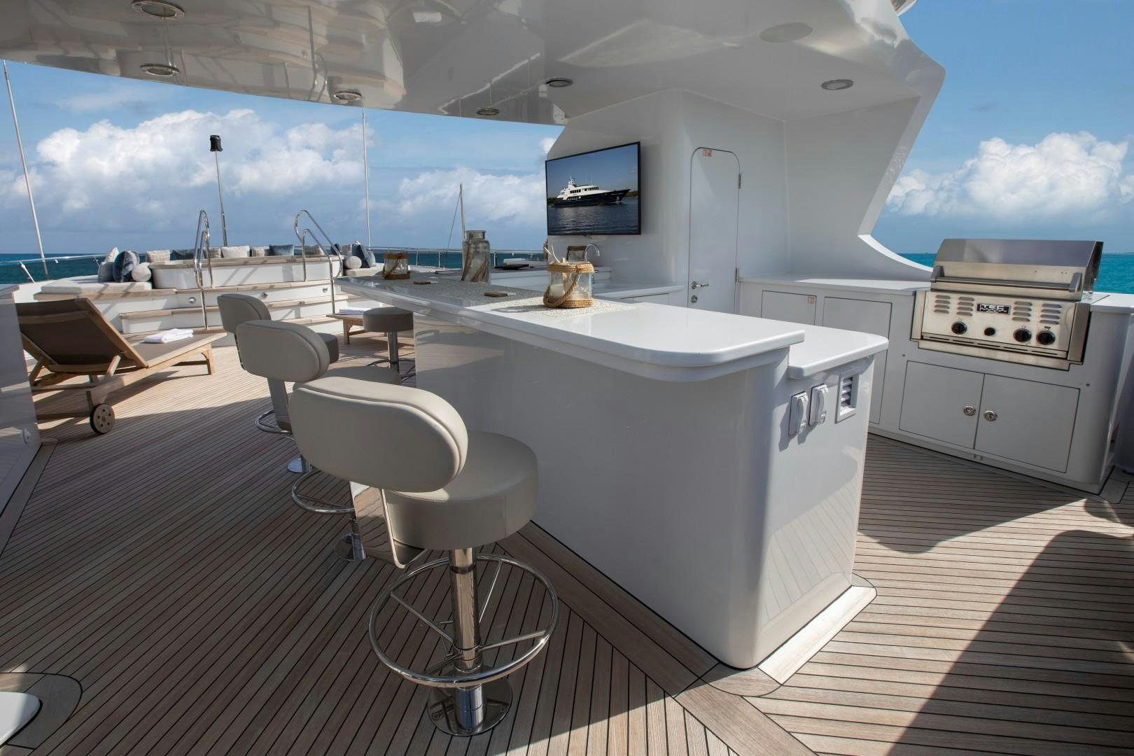 a large white kitchen with a large window aboard BACCHUS "NAME RESERVED" Yacht for Sale