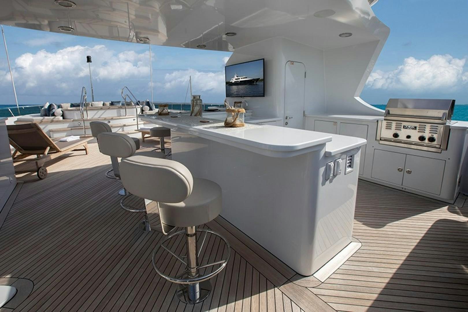 a large white kitchen with a large window aboard BACCHUS "NAME RESERVED" Yacht for Sale