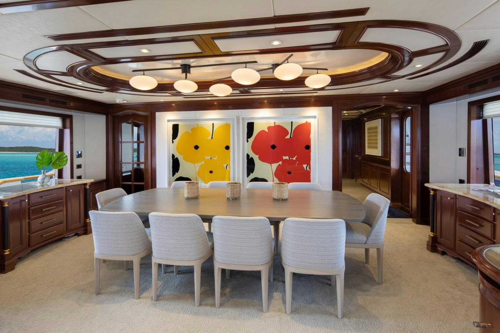 a large dining table in a kitchen aboard BACCHUS "NAME RESERVED" Yacht for Sale
