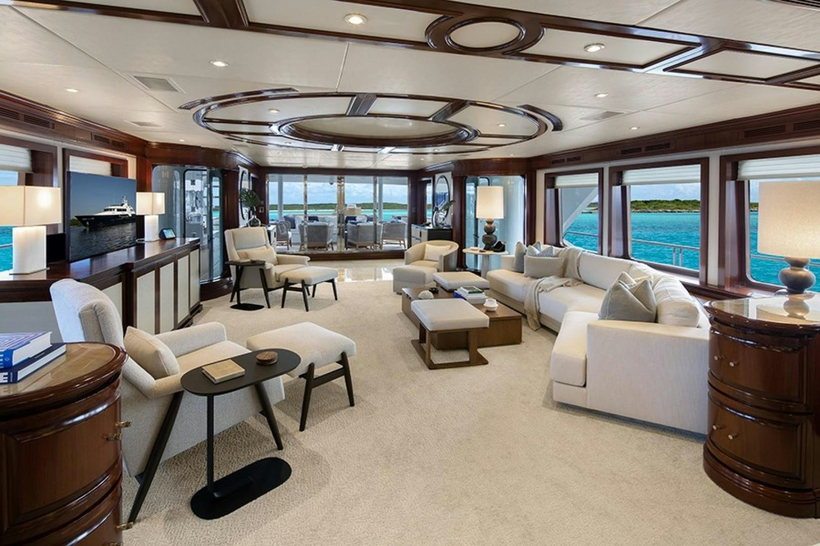 a living room with a large window aboard BACCHUS "NAME RESERVED" Yacht for Sale