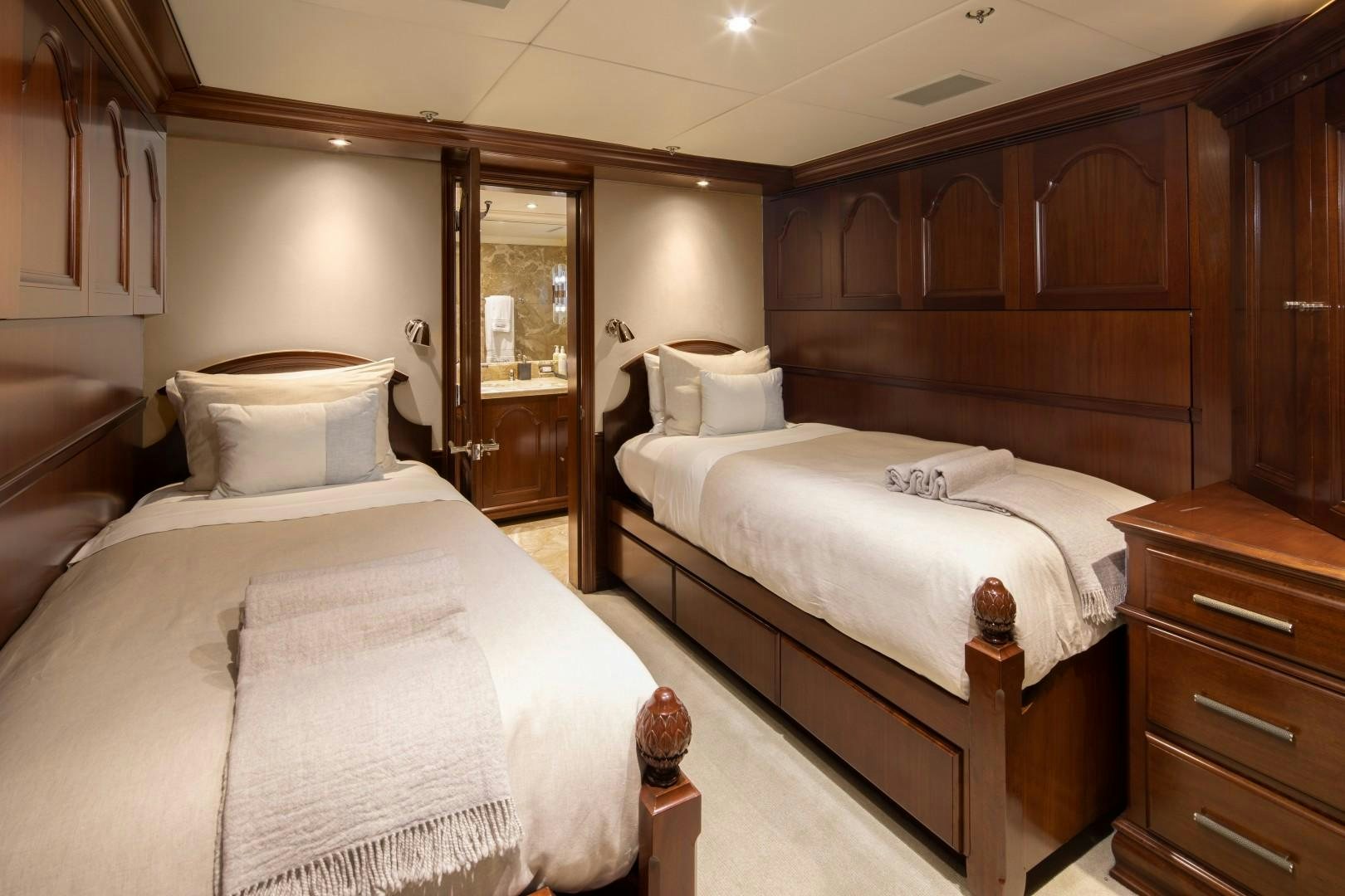 a couple of beds in a room aboard BACCHUS "NAME RESERVED" Yacht for Sale