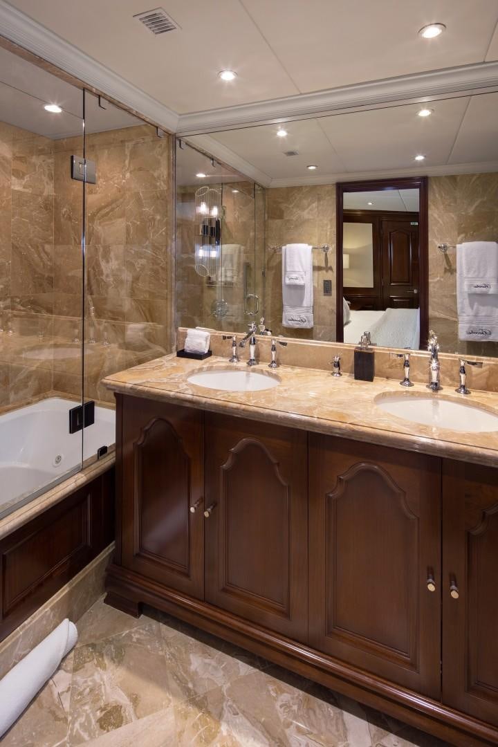 a bathroom with a large mirror aboard BACCHUS "NAME RESERVED" Yacht for Sale