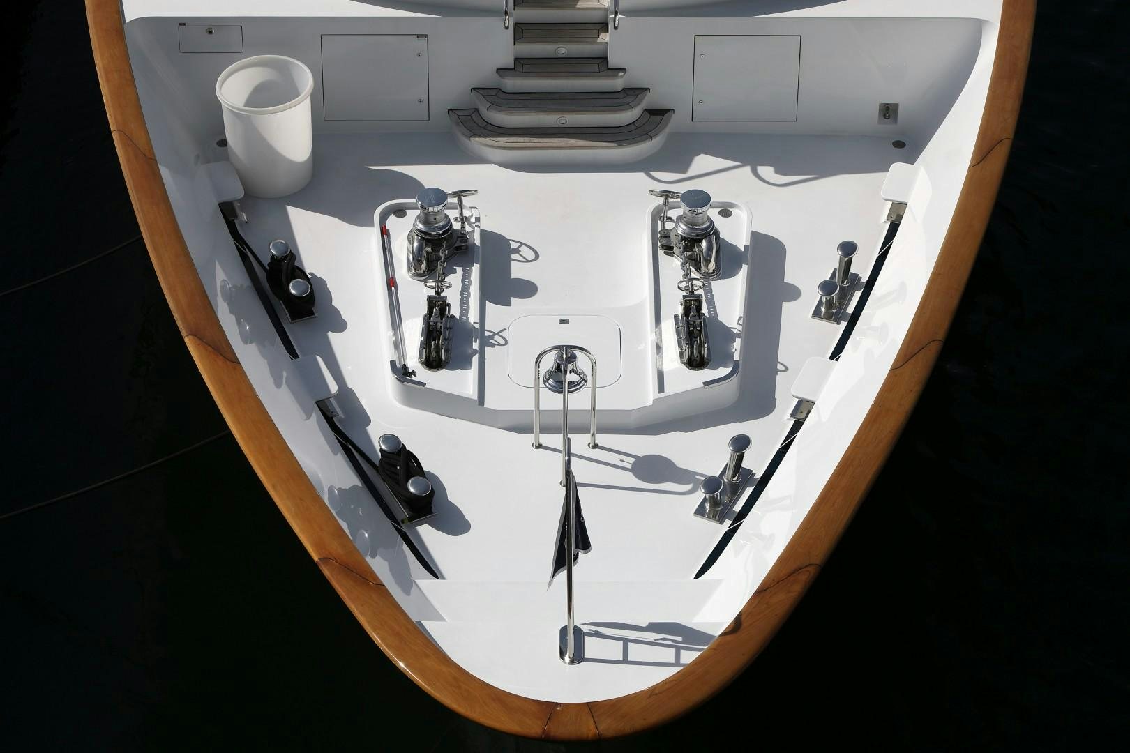 a white rectangular object with a black handle and a black object on a white surface aboard BACCHUS "NAME RESERVED" Yacht for Sale