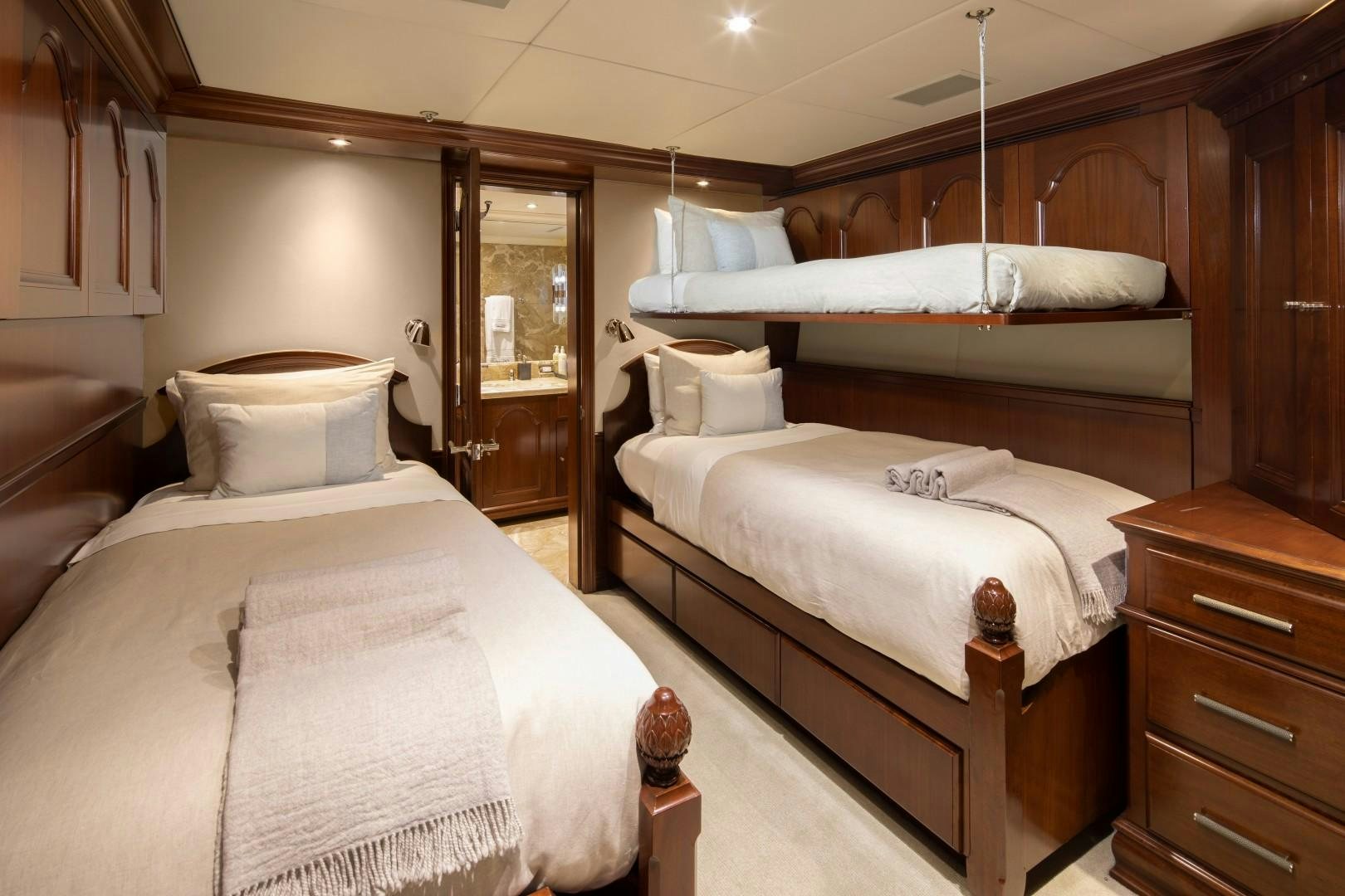 a couple of beds in a room aboard BACCHUS "NAME RESERVED" Yacht for Sale