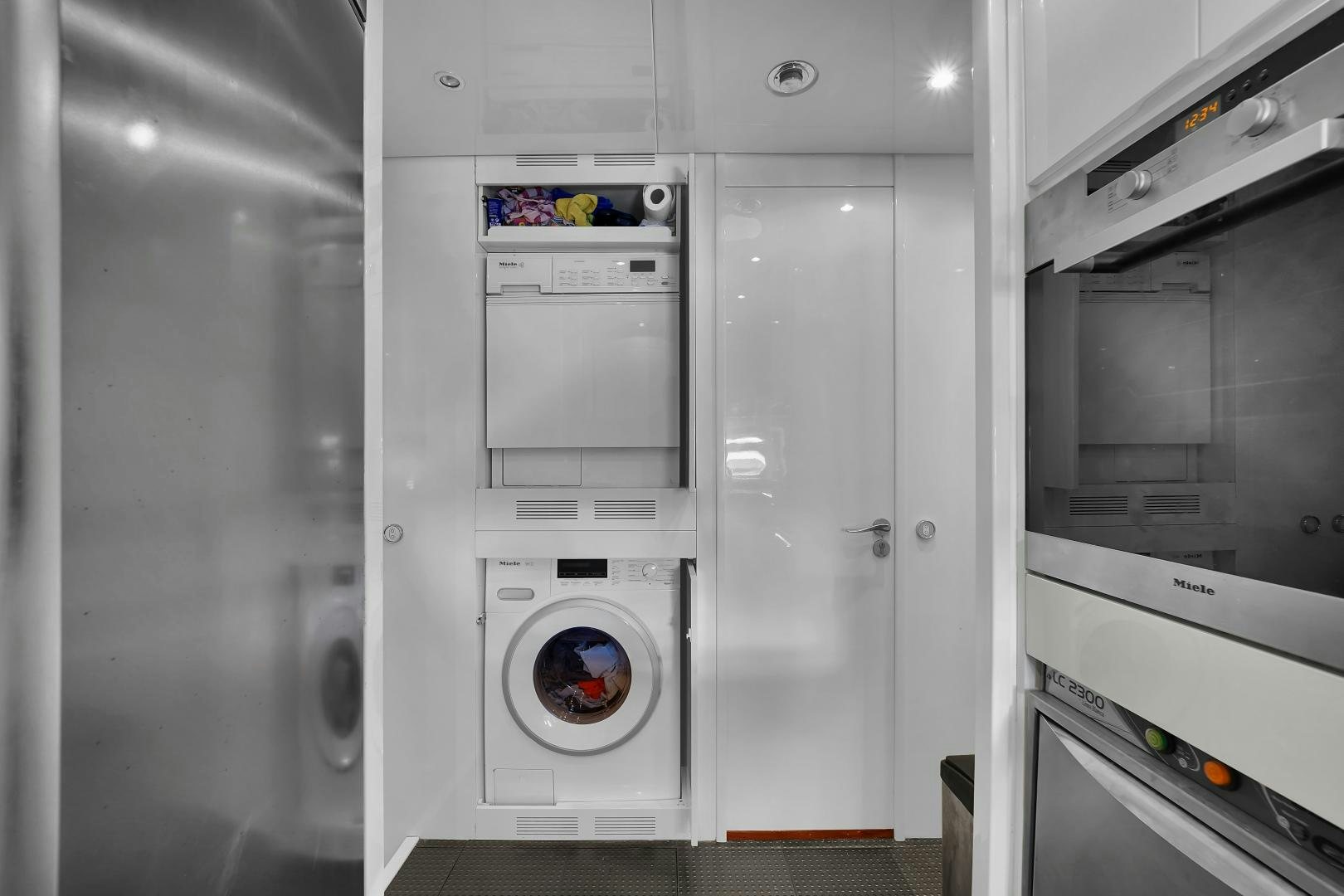 a room with several washing machines aboard CHURRI Yacht for Sale