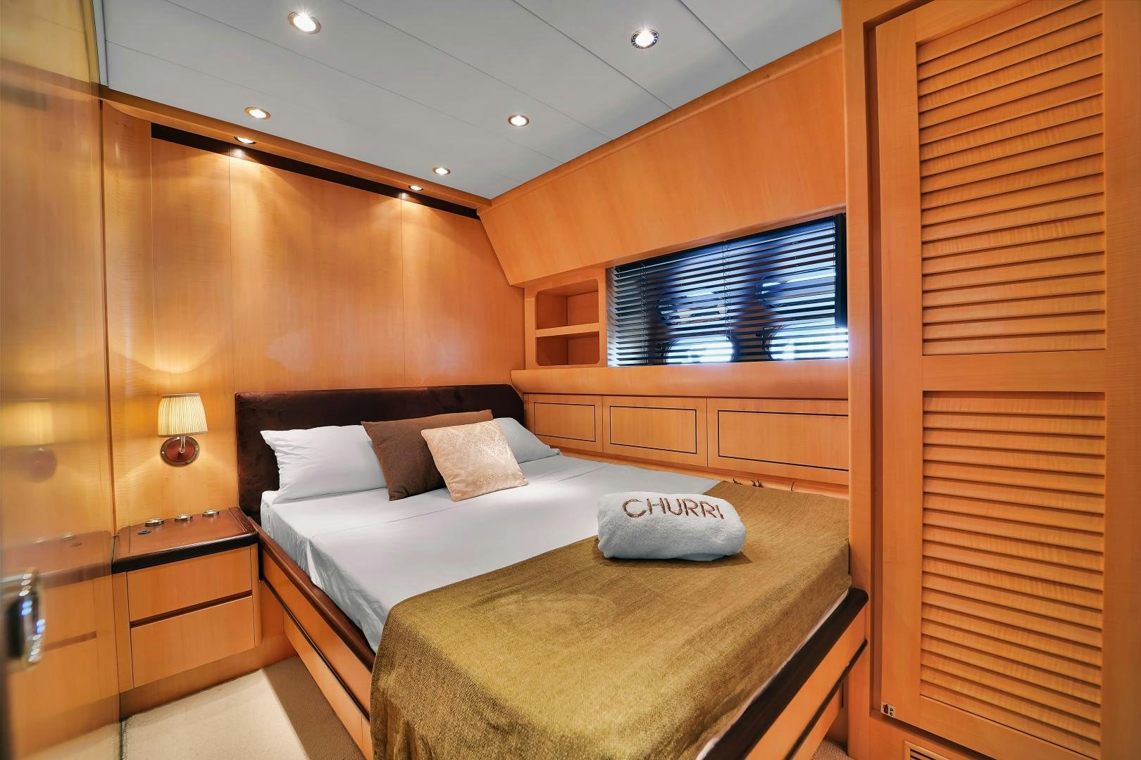 a bed in a room aboard CHURRI Yacht for Sale