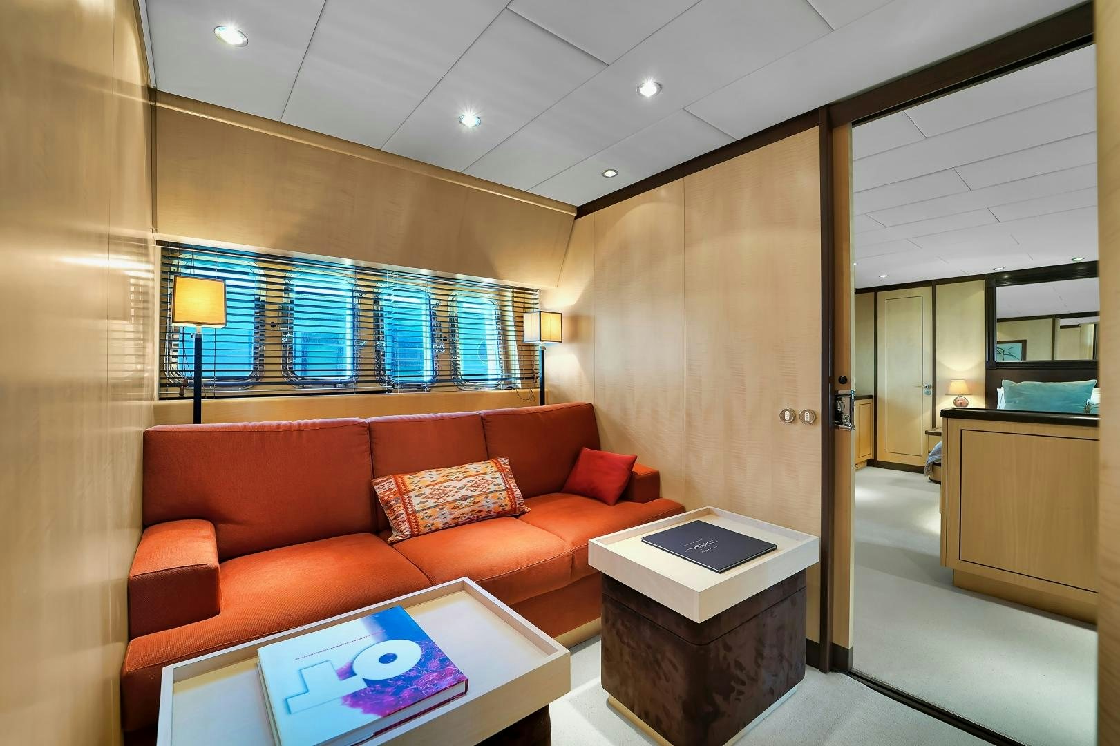 a living room with a couch and a table aboard CHURRI Yacht for Sale