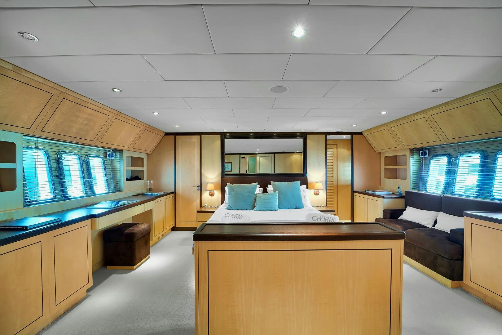 a room with a bed and a desk aboard CHURRI Yacht for Sale