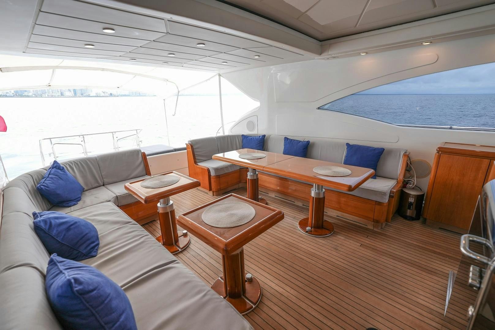 a living room with a couch and a table aboard QUERENCIA Yacht for Sale