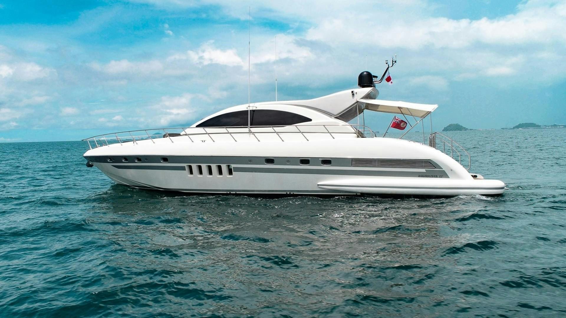 a white yacht in the water aboard QUERENCIA Yacht for Sale