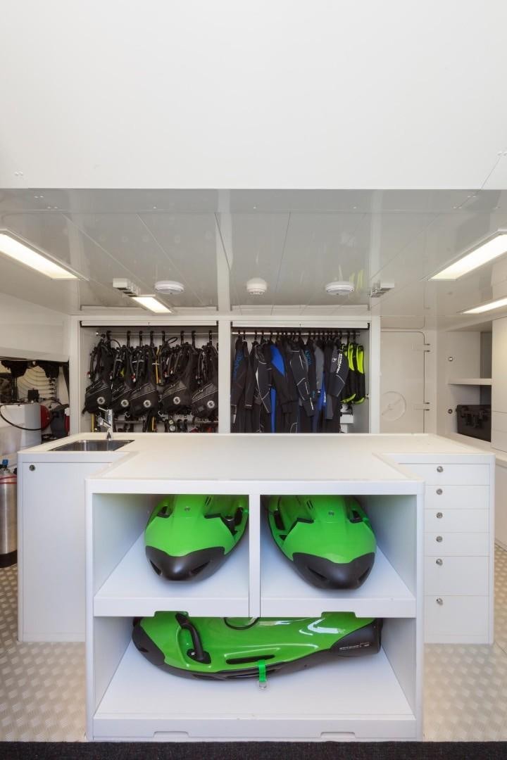 a green helmet on a counter aboard ACALA Yacht for Sale