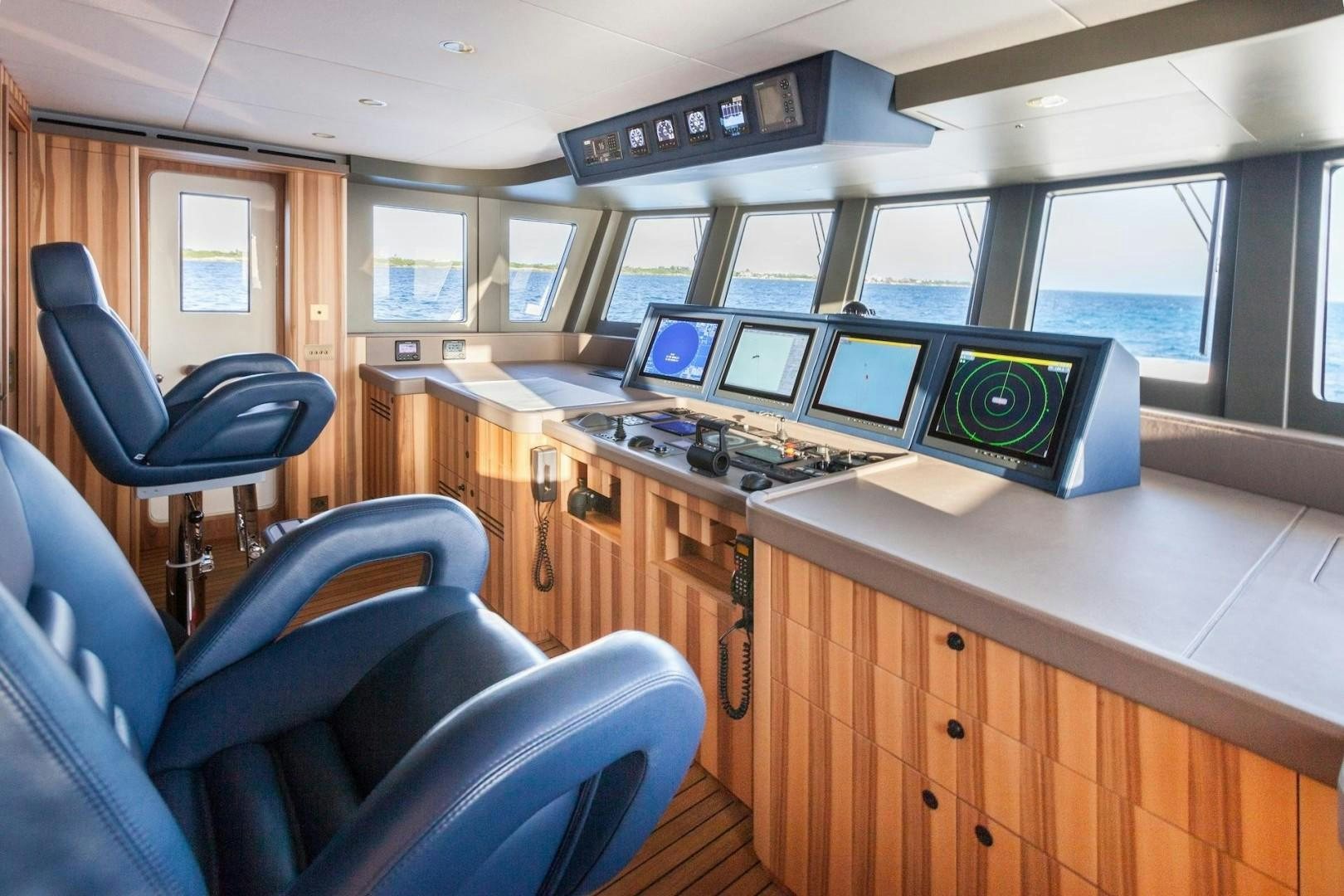 a room with many computers aboard ACALA Yacht for Sale