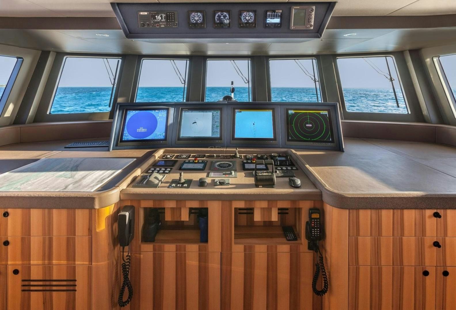 a control panel in a control room aboard ACALA Yacht for Sale