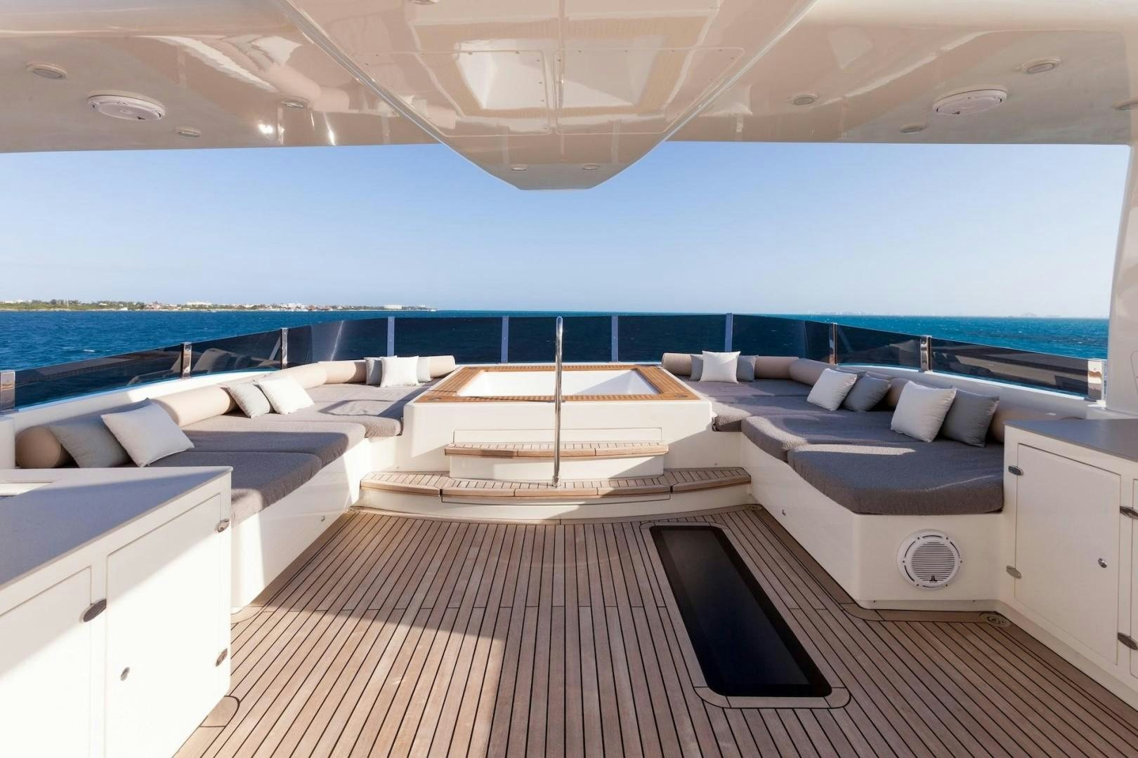 a room with a bed and a couch aboard ACALA Yacht for Sale