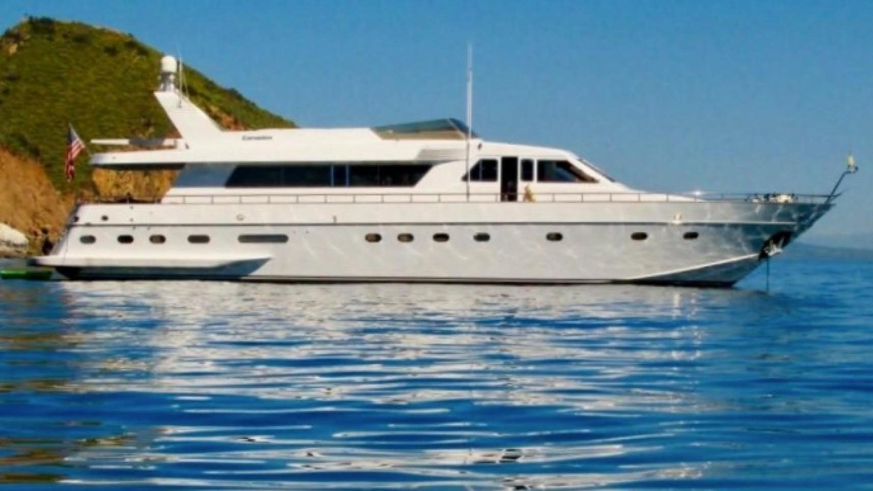 a white yacht in the water aboard LADY C Yacht for Sale