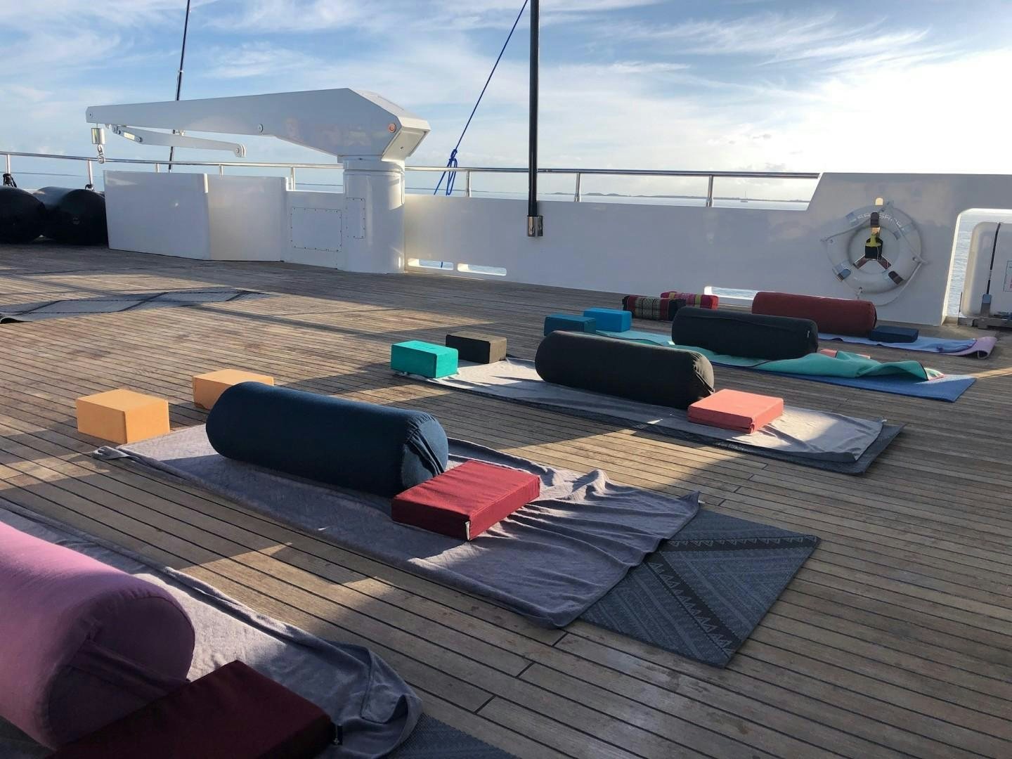 a deck with a few large containers aboard SAMSARA Yacht for Sale