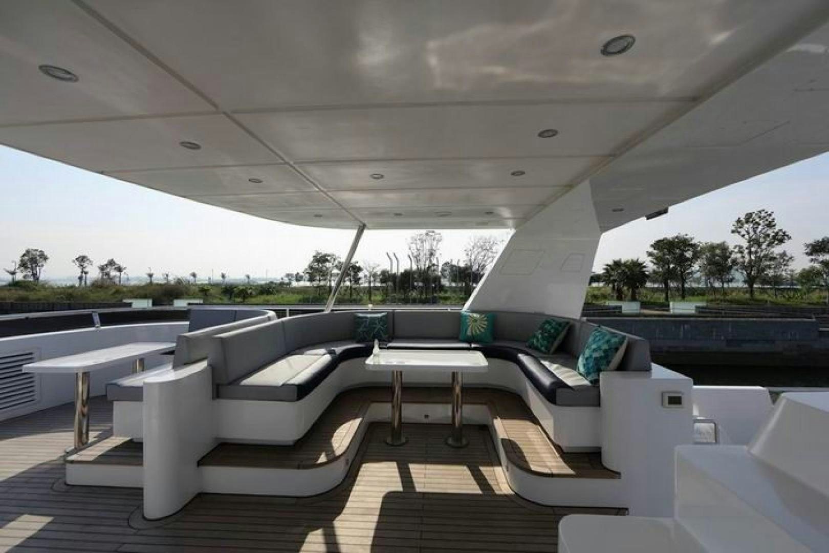 a room with a couch and a table aboard SAMSARA Yacht for Sale